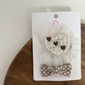 Close-up of quilted heart hair clip and polka dot bow accessory for kids - Heart Hair Clip Set