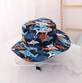Kids navy blue bucket hat featuring cartoon shark patterns with adjustable white chin strap - EU 48 / Navy Shark