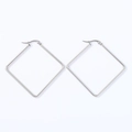 Detailed close-up of large geometric square stainless steel hoop earrings in silver finish - Rhombus (Steel Color)