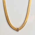 Gold herringbone chain necklace featuring a rectangular pendant with four blue gemstones - Blue