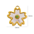 Dettaglio del ciondolo a fiore in oro 14k con petali in madreperla e zircone verde - Zirconia Verde Frutta