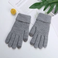 Detailed close-up of grey knitted gloves with diamond texture and ribbed cuffs - One Size / Light Gray