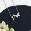 Polished stainless steel letter P necklace with butterfly silhouette on blue felt - Silver P