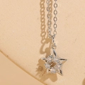 Silver star pendant necklace with sparkling white zircon inlay on a delicate chain - Star White Gold