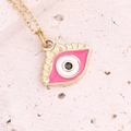 Golden necklace with a pink enamel evil eye pendant on a textured stone background - 2# Rose Red