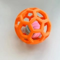 Orange TPR rubber hollow ball for pets with pink and blue woven bell ball inside - Orange with Cotton Rope Ball