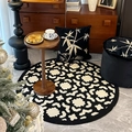 Modern round black and white patterned rug with wooden side table and matching pillows - Diameter 80cm / Blooming Flowers Round Pattern