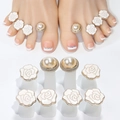 Detail of 8pcs daisy flower toe separators with white enamel petals and pearl accents - Gold Base White Flower Pearl (Set of 8)