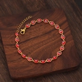 Bracciale occhio greco dorato in stile etnico con perline rosse e chiusura a moschettone - Rosso