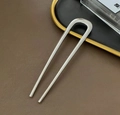 Polished silver U-shaped hair pin in a minimalist aesthetic on a leather surface - Silver Simple U-shaped Double Fork
