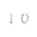 Macro view of silver wave-shaped hoop earrings with sparkling white cubic zirconia - Wavy Hoop Earrings / Silver