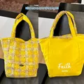 Gele geruite pluche draagtas met omkeerbaar ontwerp en Faith mole print detail - Geel Geruit (Omkeerbaar)