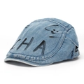 Detail of vintage washed denim ivy cap with black graffiti letters and smiley face pattern - Style A-Washed Light Blue (CHA)