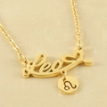 Golden Leo zodiac necklace featuring cursive script pendant and lion symbol tag - Leo
