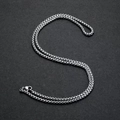 Detail of silver box chain necklace with sleek metallic luster on dark background - Single 60CM Bone Chain