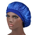 Detailed view of dark blue silky satin sleep bonnet on model with wide elastic band - One Size / Sapphire Blue