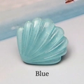Détail d'un pendentif coquillage en résine bleue pailletée pour bijoux DIY et accessoires - Bleu
