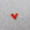 Detailed macro shot of handmade red heart-shaped bead embroidery with gold accents - 017-Large Red Heart Gold Border