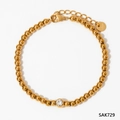 Minimalist gold beaded bracelet with a round crystal pendant and adjustable lobster clasp - Gold Beaded Bracelet (SAK729)