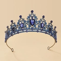 Close-up of Baroque silver alloy tiara featuring dark blue rhinestones and crystals - Gun Black + Blue Rhinestone