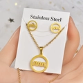 Detail of gold stainless steel necklace and stud earrings set with geometric circle patterns - TT-008/Gold Maze Pattern