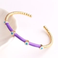 Fashionable gold-plated bamboo evil eye open cuff bracelet with purple enamel detailing - Purple