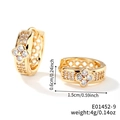 Gold hoop earrings featuring a four-leaf clover design set with clear cubic zirconia stones - Gold/White Zircon