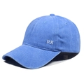 Detail of white RK embroidery on side of blue washed cotton baseball cap with curved brim - Adjustable / Light Blue