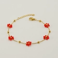 Golden stainless steel bracelet with delicate red crystal flowers and adjustable chain - Bracelet / Red