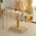 Single-tier velvet bracelet display stand with a solid wooden base and size annotations - Beige Velvet Single Tier Bangle Display Stand with Gold Caps