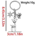 Silver metal Christmas reindeer keychain with snowflake and bells showing size specifications - ER1804-Antique Silver Snowflake Deer Bell Keychain