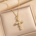 Collana con croce dorata in acciaio e zirconi ovali su elegante tessuto di seta - Stile Oro (856)