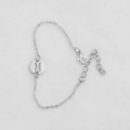 Silver bracelet with a round hollow pendant featuring the letter M on a white background - Silver M