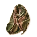 Green and beige plaid cashmere-like scarf with tassels on a plain white background - Green
