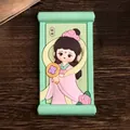 Cute chibi Diao Chan figurine in traditional dress on a green scroll ornament - Diao Chan Fridge Magnet
