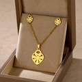 Detailed shot of golden heart-shaped floral jewelry set inside an elegant gift box - Heart Flower (TZ-440)