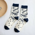 Beige cotton socks featuring peach candy patterns and blue accents in mid-calf length - One Size / Navy Blue Sock Cuff