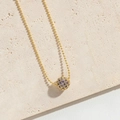 Elegant gold ball chain necklace featuring a spherical pendant with purple cubic zirconia pavé - Copper/Zirconia / Spherical Pendant / Purple
