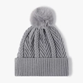 Grey cable knit beanie hat with a fluffy faux fur pompom and ribbed cuff for women - Blue Gray