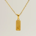 Close-up of gold stainless steel necklace featuring a rectangular Letter J pendant - Letter J