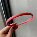 Slim satin fabric headband in vibrant coral pink finish for everyday hair styling - Watermelon red