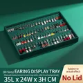 Dark green velvet earring display tray with 80 slots, size 35x24x3cm for jewelry storage - Earring Tray