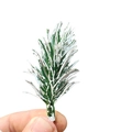 Close-up of a single artificial green pine needle branch with white snow coating detail - 6CM Frosted White Pine Needle