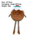 Christmas pudding plush toy doll with striped legs and berry leaf detail, 16x10cm size - Chocolate Cake
