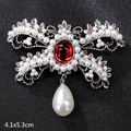 Retro bow brooch in silver with red oval stone and white drop pearl, 4.1x5.3cm - Vintage Bowtie