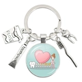 Dentist gift keychain with toothbrush and toothpaste charms on round glass pendant - Dentist Color Matching Scene (21)