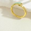 Detail of 14K gold-plated snake ring with green enamel and sparkling zircon accents - Green Enamel
