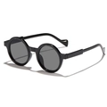 Klassische Retro-Sonnenbrille mit rundem Rahmen in glänzendem Schwarz und dunklen Gläsern - Schwarzer Rahmen Graue Gläser
