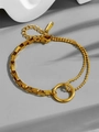 Detail of gold titanium steel bracelet showing dual-chain design and circular ring connector - Spliced Ring Bracelet Gold (S670)