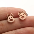 Rose gold reindeer stud earrings featuring star antler details held between fingers - Rose Gold Reindeer (660)
